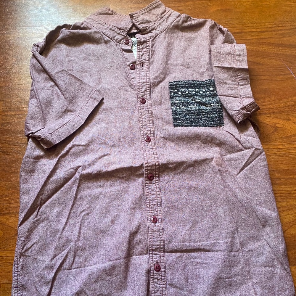 On the byas button up tee